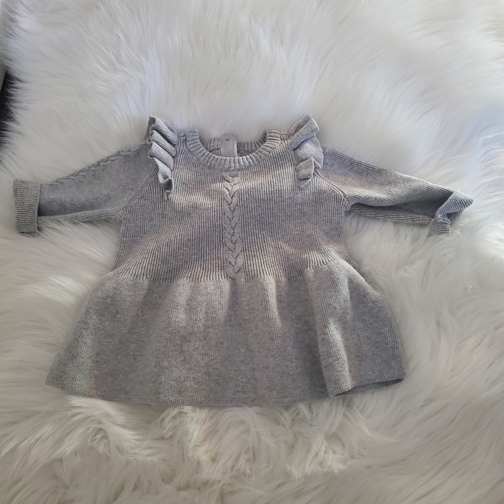 Knitted newborn dress